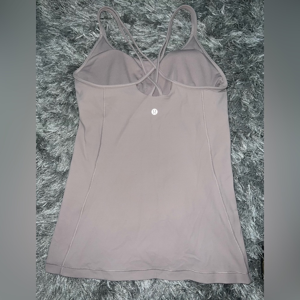 Lululemon razorback tank, size 6-8 light pink.